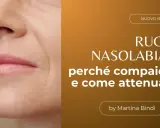 Primo piano del viso con evidenti solchi naso labiali. Testo: "Rughe nasolabiali: perché compaiono e come attenuarle".
