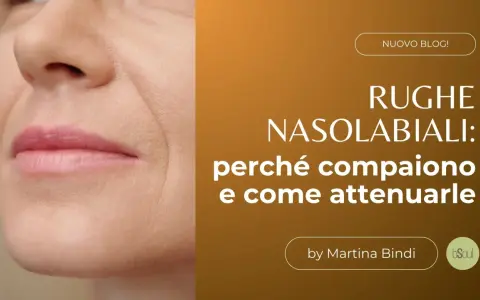 Primo piano del viso con evidenti solchi naso labiali. Testo: "Rughe nasolabiali: perché compaiono e come attenuarle".
